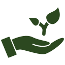 eine grüne Hand, die eine Pflanze hält